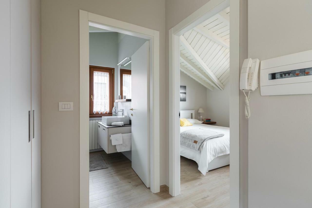 Apartamento Mansarda I Cipressi Lenno Exterior foto