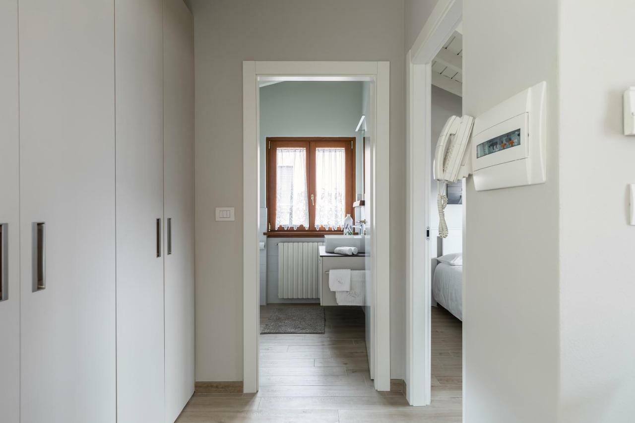 Apartamento Mansarda I Cipressi Lenno Exterior foto