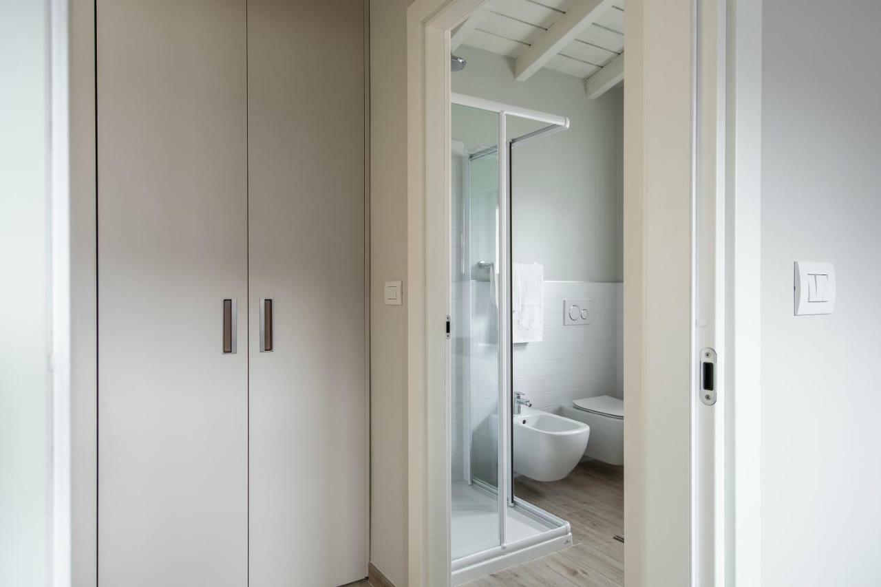 Apartamento Mansarda I Cipressi Lenno Exterior foto