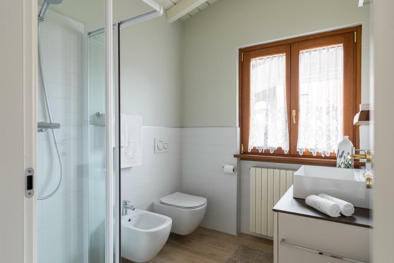 Apartamento Mansarda I Cipressi Lenno Exterior foto