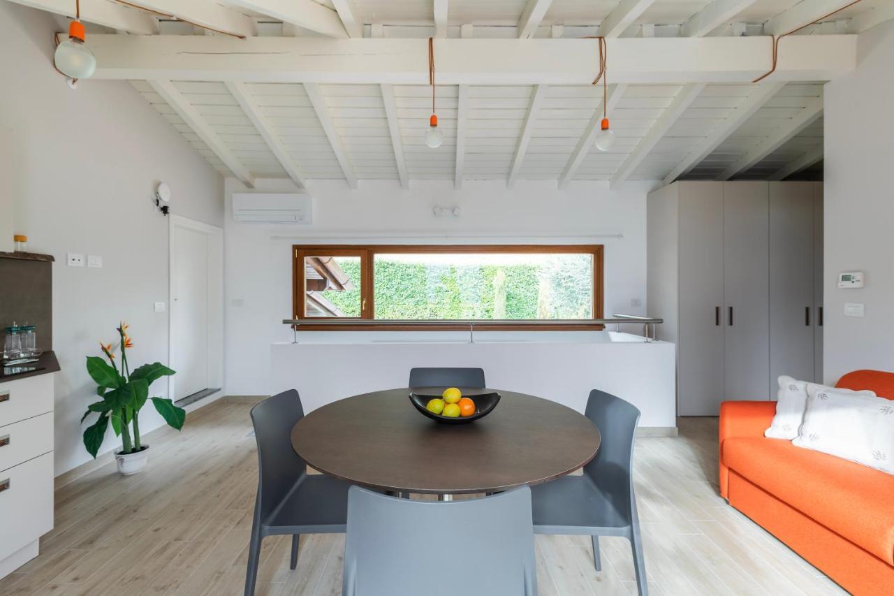 Apartamento Mansarda I Cipressi Lenno Exterior foto